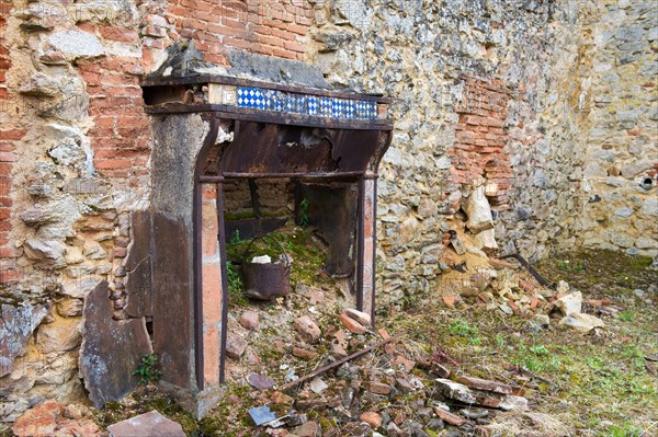 Interior of broken house Destroyed in Oradour sur Glane in the French Limousin