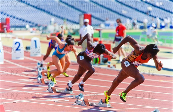 Start of Olympic race, women runners, in stadium. Atlanta 1996.