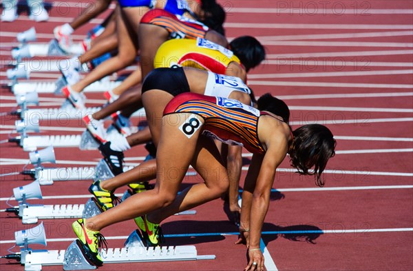 Start of Olympic race, women runners, in stadium. Atlanta 1996.