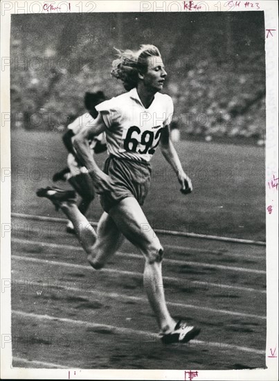May 05, 1948 - Woman track and field: London England Olympic: First round of the women's 200metres event. Photo shows Fanny Blankers-Koen (Holland) nearest winning Heat 1 of the women's 200 metres, at Wembley, today.
