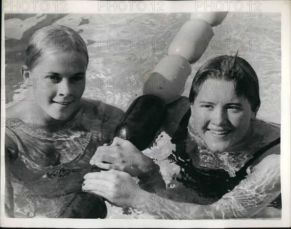 Aug. 08, 1960 - Olympic games in Rome.: Miss G. Schuler, of America, set up new Olympic record for the 100 Meters Butterfly event , during a heat in Rome yesterday. Her time was 1 min. 9.8 sees. Miss J. Andrew of Australia, was second. Photo shows Miss Schuler (right), the winner, and miss Andrew, who was second, after the race.