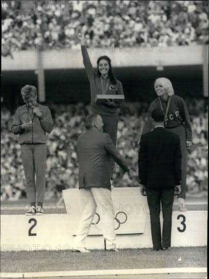 Oct. 10, 1968 - French Girl runner wins the first gold medal for France: French Girl runner Colette Besson brought the first Olympic Gold Medal to France after winning the 400 m. race in 52''. Photo shows the finish of the 400 m. Colette Besson (Centre) and her rival board (Gr. Britain, No. 12). left.