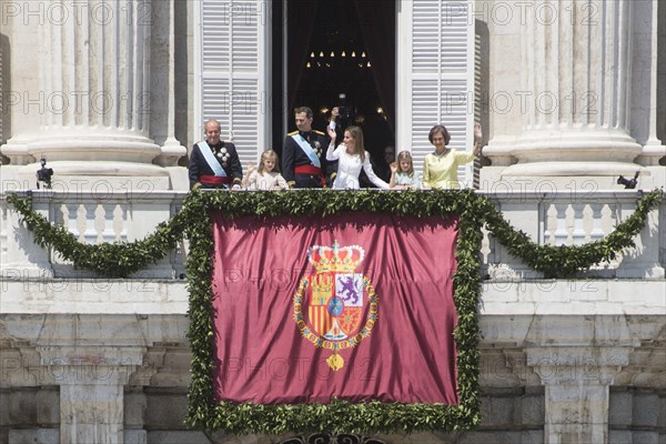 Madrid, Spain. 19th June, 2014. On June 19 he was crowned as the new king of Spain, Prince Felipe VI. After the abdication of Juan Carlos I of Spain his son succeeds to the Spanish crown. Crowd of citizens and tourists attended the event at the Palacio de Oriente. 19th June, 2014. Credit:  Nacho Guadano/ZUMA Wire/ZUMAPRESS.com/Alamy Live News