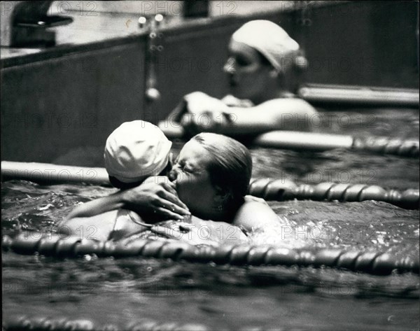 1964 - Swimming Galina Prozumenschikova of USSR, gives a big kiss and hug to one of her competitors after, winning the Gold Medal, in the Women's 200 Metres Breast stroke and setting a new Olympic record of 2, 46.4 © Keystone Pictures USA/ZUMAPRESS.com/Alamy Live News