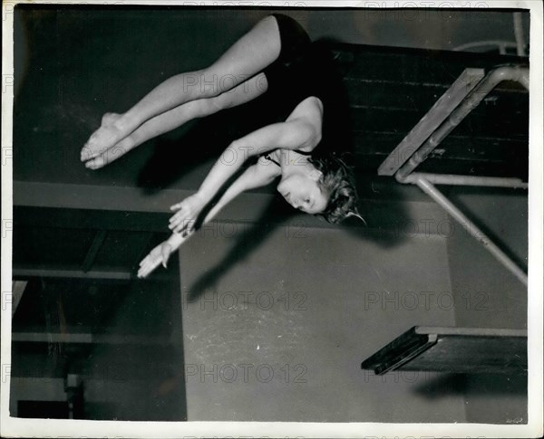 1968 - Thirteen year old Margaret to represent Britain. She is an Olympic diving hope.: Thirteen year old Margaret Austen of Kenton, Middlesex - learned yesterday that she had been chosen to dive for Britain against east Germany in Leipzig on June 11 and 12. Margaret who is only 4ft. 10. in. in height - will dive from the 10 metre high board. Being chosen for this contest puts Margaret in line as a Possible for the Olympics. Photo shows Margaret Auston diving into the water during training at the Ironmonger Road Baths London this morning. © Keystone Pictures USA/ZUMAPRESS.com/Alamy Live News