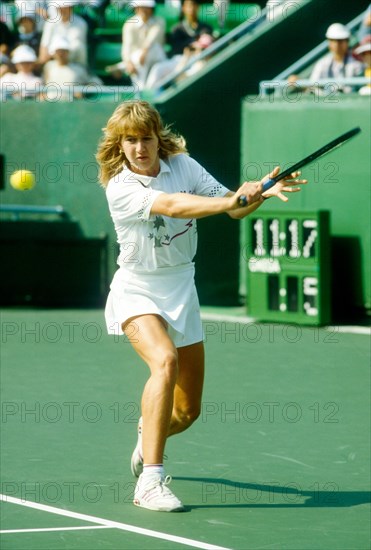 Steffi Graf (GER) competing at the 1988 Olympic Summer Games in the year she won the Golden Slam.