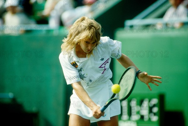 Steffi Graf (GER) competing at the 1988 Olympic Summer Games in the year she won the Golden Slam.
