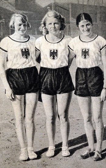 Photograph of (Left to right) Ottilie ("Tilly") Fleischer (1911 - 2005), Ellen Braumuller (1910 - 1991) & Maria "Marie" Dollinger-Hendrix (1910 - 1994). These women competed for Germany during the 1932 Olympic games.