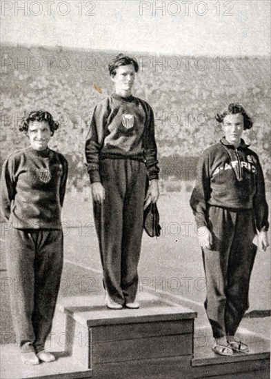 80m Hurdles podium at the 1932 Olympic games.  Mildred Ella "Babe" Didrikson Zaharias (1911 - 1956) took gold for the USA. Evelyne Ruth Hall (1909 - 1993) took silver for the USA. Marjorie Rees Clark (1909 - 1993) took bronze for South Africa.