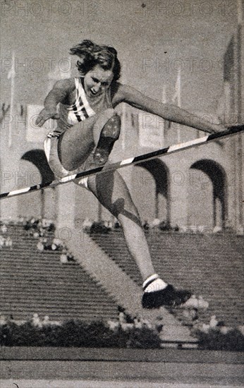 Photograph of Jean Shiley (1911- 1998) high jumping at the 1932 Olympic games. Although jumping the same height as Babe Didrikson 1.676 meters, Jean was awarded the Gold medal as Didriksons jump was considered as "diving".