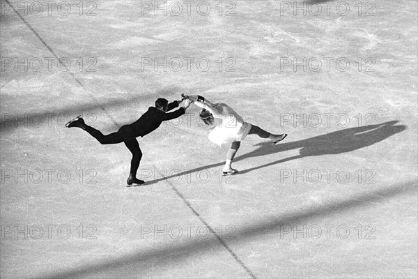 Winter Olympics - Germany, Third Reich - Olympic Winter Games, Winter Olympics 1936 in Garmisch-Partenkirchen.  German Maxi Herber and Ernst Baier (?) - Gold Medal winner for pair figure skating at the Olympic  Ice sport center.  Image date February 1936. Photo Erich Andres