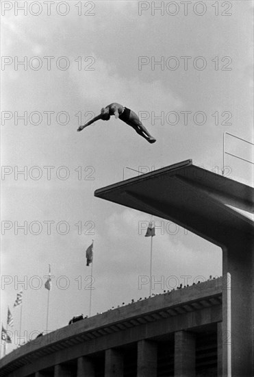 Summer Olympics 1936 - Germany, Third Reich - Olympic Games, Summer Olympics 1936 in Berlin. Men swimming competition at the swimming stadium  - platform  diver - view of the jump. Image date August 1936. Photo Erich Andres