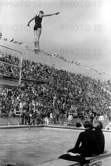 Summer Olympics 1936 - Germany, Third Reich - Olympic Games, Summer Olympics 1936 in Berlin. Women swimming competition at the swimming stadium  - platform diver - view of the jump. Image date August 1936. Photo Erich Andres