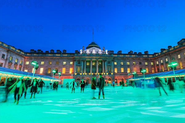 Somerset House, London, UK, 13th November 2019. Visitors enjoy skating on the pristine ice in the beautifully illuminated surroundings of Somerset House, as the annual 'SKATE' ice rink opens to the public. The outdoor area also features a bar and viewing area. Somerset House ice rink will be open 13th Nov 2019 - 12th Jan 2020 Credit: Imageplotter/Alamy Live News