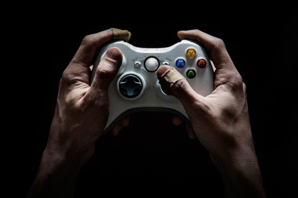 Dirty and damaged hands worn from playing too many computer/video games.