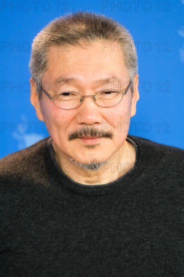 Grand Hyatt Hotel, Potsdamer Platz, Berlin, Germany. 25th Feb, 2020. Hong Sangsoo poses at THE WOMAN WHO RAN Photocall. Picture by Credit: Julie Edwards/Alamy Live News