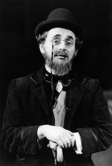 Sylvester McCoy (Erik Satie) in SATIE DAY / NIGHT by Adrian Mitchell at the Lyric Hammersmith Studio, London W6 1986 design: Tom Phillips lighting: Dave Horn director: Richard Williams