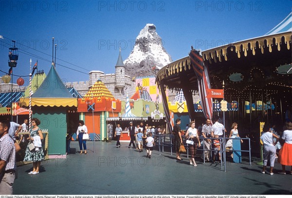 Disneyland in the 1950s. A theme park at the Disneyland Resort in Anaheim, California. It was the first theme park opened by The Walt Disney Company and the only one designed and constructed under the direct supervision of Walt Disney, and opened on July 17, 1955. On the left the Swiss Chalet Skyway cable car. In the center the Matterhorn bobsled roller coaster. 1959. Anders Svahn ref SVA9