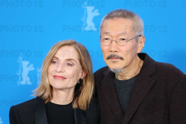 Berlin, Germany, 19th February 2024, Isabelle Huppert and Director, Screenwriter, Producer, Camera, Editor, Hong Sangsoo at the photo call for the film A Traveler’s Needs (Yeohaengjaui Pilyo) at the 74th Berlinale International Film Festival. Photo Credit: Doreen Kennedy / Alamy Live News.