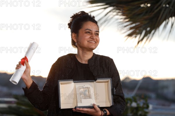 CANNES, FRANCE - MAY 25: Payal Kapadia poses with the Grand Prix Award for 'All We Imagine As Light' during the Palme D'Or Winners Photocall at the 77th annual Cannes Film Festival at Palais des Festivals on May 25, 2024 in Cannes, France.CAP/GOL ©GOL/Capital Pictures