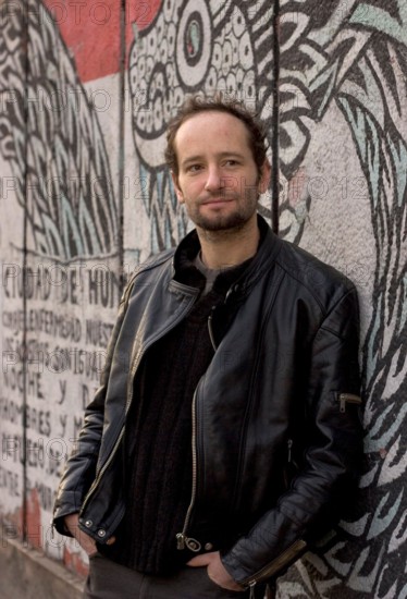 Jan 19, 2006; Mexico City, MEXICO; Mexican film maker, CARLOS REYGADAS' work is quintessentially Mexico City, here photographed in front of a decomposing mural on the streets of the historical center of Mexico City. His recent movie, 'Batalla en el Cielo' or 'Battle in Heaven,' was pulled from its original screening at the Sundance festival this year because of its opening scene, a young woman performing fellatio on an older, chubby man. The film was shown at other screenings as part of the festival and is scheduled to open Feb. 24 in Los Angeles. Reygadas won the Camera d'Or 'special mention
