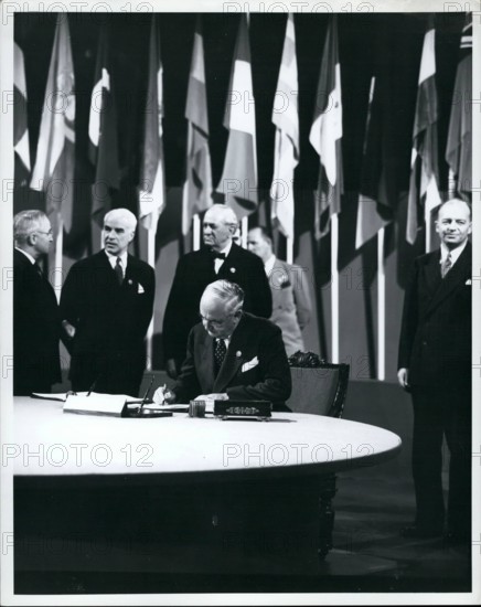 Jun. 06, 1945 - The San Fransisco Conference Arthur H Vandenberg, Untied States Senate, member of the Delegation from the Untied Sttes, signing the United Nations Charter, 26 June 1945