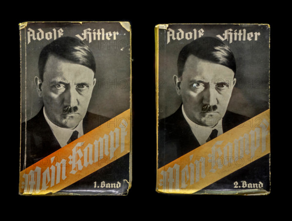 Volume 1 and 2 of the German book Mein Kampf / My Struggle, autobiographical manifesto by Nazi leader Adolf Hitler