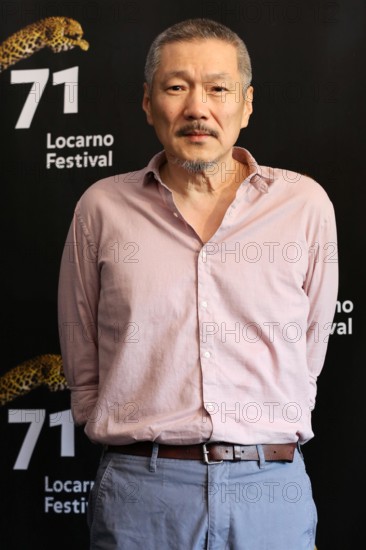 LOCARNO, SWITZERLAND – AUG 09, 2018: Hong Sang-soo attends the 'Gangbyun Hotel' photocall at the 71st Locarno Film Festival (Photo: Mickael Chavet)