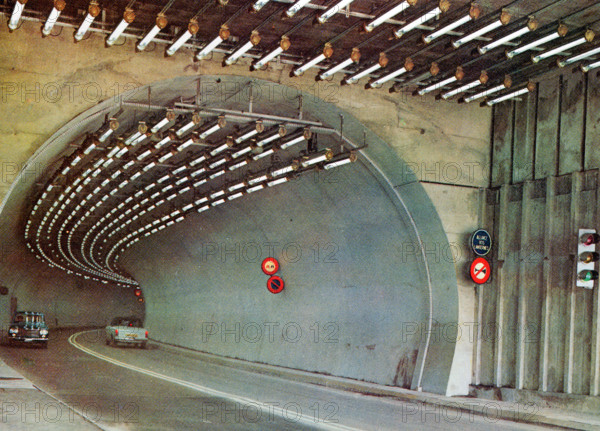 A postcard image of the Mont Blanc tunnel which runs 11.8km between France and Italy. At the time of opening in July 1965 it was three times longer than any rival tunnel. Original publisher: Couleurs Naturelles
