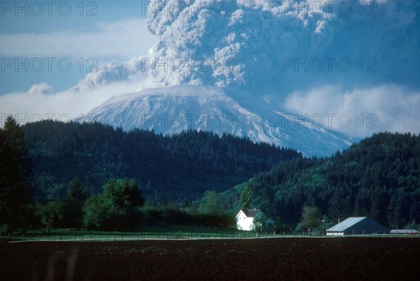 Giant plumes of volcanic ash pour from Mount St. Helens on the day of its major eruption, May 18, 1980.