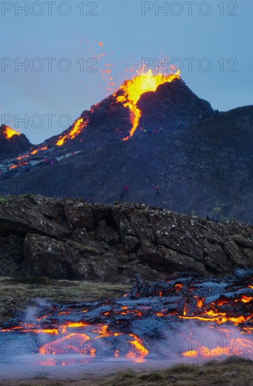 Molten lava flowing from a small volcanic eruption in Mt Fagradalsfjall, near the capital of Reykjavik, Southwest Iceland, in March 2021.