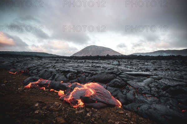 MAY 2021: The broader Fagradalsfjall volcanic system comprises an area of eruptive fissures (fissure swarm), cones and lava fields in the southern part of the Reykjanes peninsula. A strong seismic crisis began in the area near Fagradalsfjall since late Feb 2021, interpreted as intrusion of magma at shallow depth. This led to the first historic eruption of the volcano on 19 March 2021.