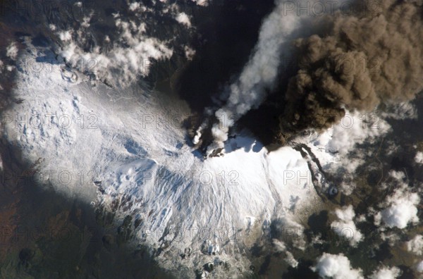 SICILY Features: MOUNT ETNA ERUPTION PLUME 7/11/02 An optimised and enhanced version of a NASA image / credit NASA.