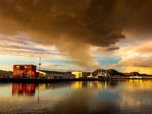 Gas cloud from Fagradalsfjall, view of volcanic eruption at Grindavik Harbor, Iceland