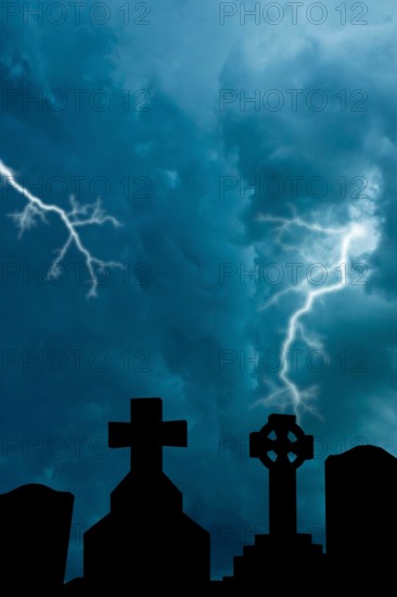 cemetery tombs and stormy sky