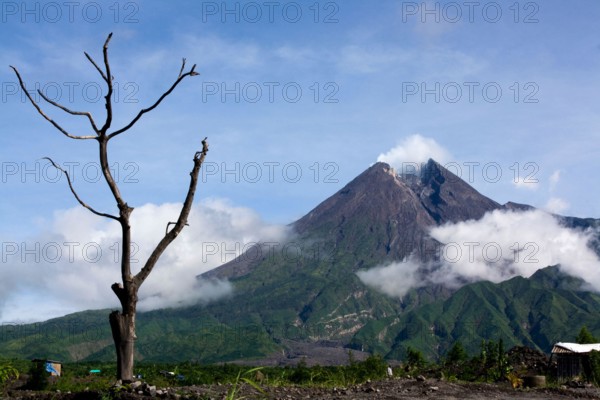 Mount Merapi, a cone-shaped and most active type of volcano in Indonesia. Has a height of 2968 meters.