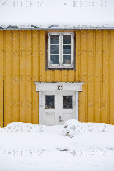 Traditional wooden buildings along Storgata in the quaint area of Tromso, in the Arctic Circle in Northern Norway