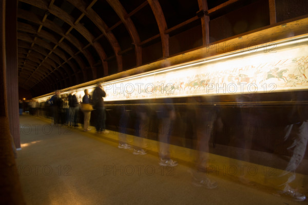 Bayeux, France. Tourists and the famous tapestry which depicts the events leading to the Norman conquest of England in 1066.