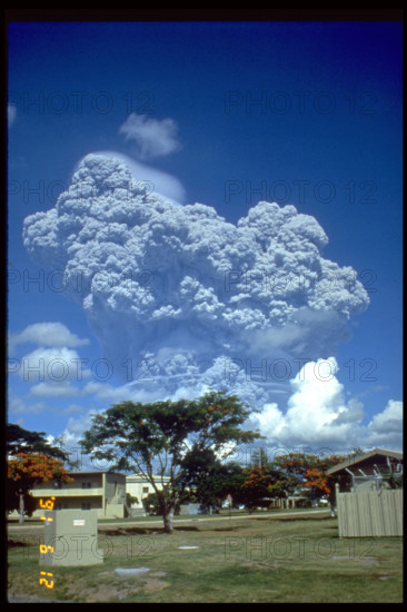 The eruption of Mount Pinatubo observed from Clark Air Base on June 12, 1991. This volcanic event caused widespread devastation and is one of the largest eruptions of the 20th century.