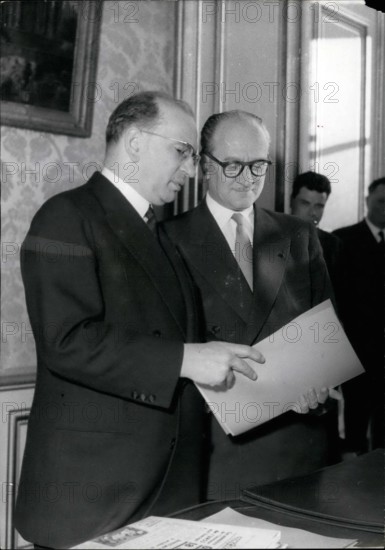 Feb. 02, 1956 - New Premier Takes Over: M. Guy Mollet, the new French Prime Minister, took over his office from his predecessor, m. Edgar Faure, at Matignon, prime minister's official residence this afternoon. m. Guy mollet and Edgar Faure during the ceremony.