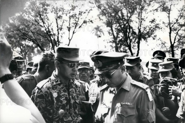 Feb. 24, 2012 - Grief exchanged - Maj. General Suharto (left) newly appointed Army Chief of Staff in Indonesia, talks with fellow officer outside Army Headquarters in Djakarta prior to funeral services October 5, 1965 for 6 generals slaughtered during Communist abortive coup of October 1. At time of picture, Suharto was commander of the Strategic Army Reserve. Speaking to Minister/Commander of the Navy, Vice Admiral R.E. Martadinata (Martadinata was replaced Feb 22nd 1966 by Vice Admiral Muliadi)
