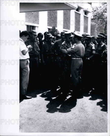 Feb. 28, 2012 - Grief stricken - Maj. General Suharto, newly appointed Army Chief of Staff in Indonesia, (in jungle suit) greets another officer at funeral services at Army Headquarters in Djakarta on October 5, 1965 for the 6 Indonesian generals massacred by communists during October 1 abortive coup.