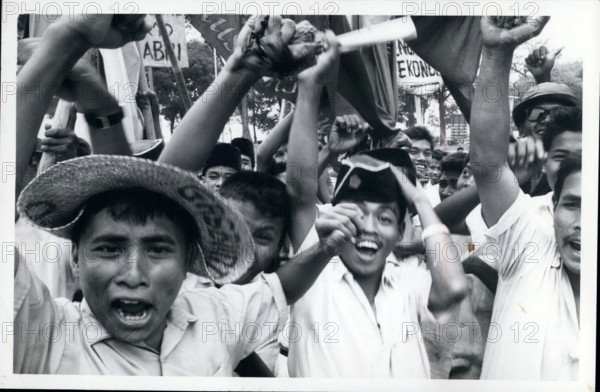 Apr. 18, 2012 - Indonesia, Jakarta -- Muslim students stage mass anti-Communist rallies with 5,000 to 10,000 demanding the Communist Party and the affiliates be banned after aborted Red coup of Oct 1, 1965. The Communist Party (PKI) was suspended on Oct 18. Here they are shouting ''gagang aidit'' - kill aidit.