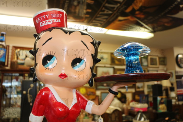 Betty boop statue , statue holding mushroom , waitress holding serving tray