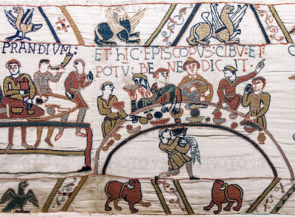 Scene 43 of the Bayeux Tapestry depicts a banquet, possibly celebrating William the Conqueror's victory. The embroidery illustrates medieval dining customs, with figures feasting at a table, emphasizing Norman culture and historical events leading up to the Norman Conquest of England.
