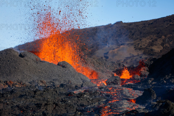 Fountains of lava explode into the air. HAIR-RAISING images show of one of the world’s most active volcanoes in the world exploding into life. The series of spectacular pictures from this latest eruption shows the red hot Piton de la Fournaise volcano oozing a sea of burning lava. Other sensational images show the molten eruption lighting up the evening sky. French photographer Gabriel Barathieu (33) braved the conditions to take these sensational shots of the volcano on Réunion Island just off of the east coast of Madagascar.