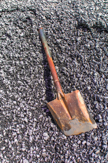 Gravel and shovel to creative texture and pattern for design and decoration isolate on background.Copy space.