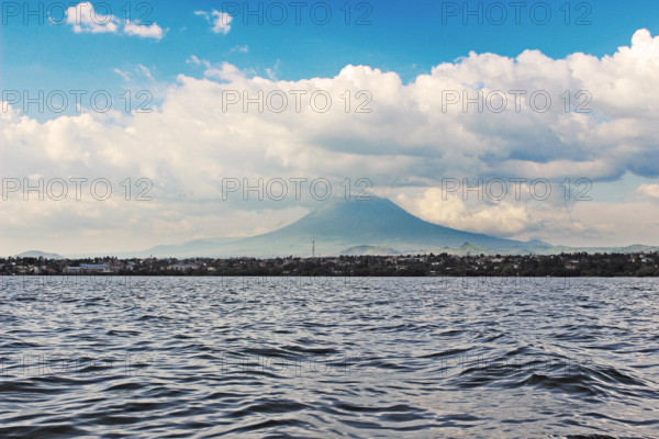 Lake Kivu, Rwanda, with Mount Nyiragongo of DR Congo in the Background. Nice Weather for a Boat Ride.