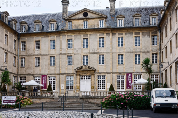 Bayeux Tapestry Museum, entrance, old stone building, symmetrical, Europe, Normandy; Bayeux; France; summer; horizontal