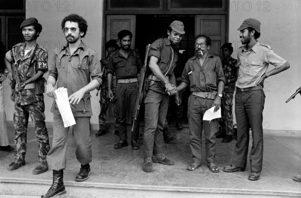 Jose Ramos-Horta leaving president Xavier do Amaral's HQ Dili East Timor 1975. Future presidents present - Lobarto and Jose RH